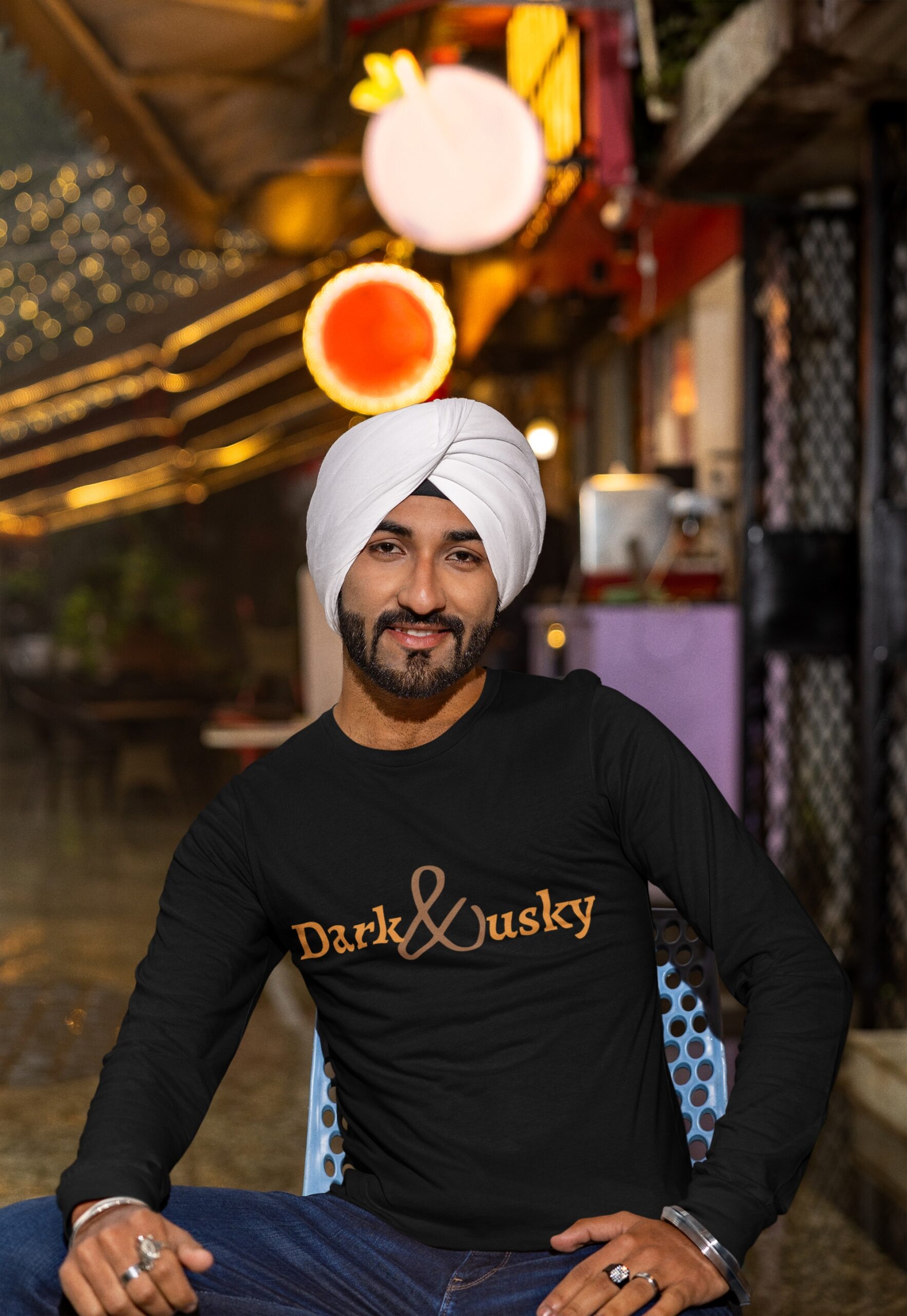 bella-canvas-long-sleeve-t-shirt-mockup-of-a-smiling-man-wearing-a-turban-m38607