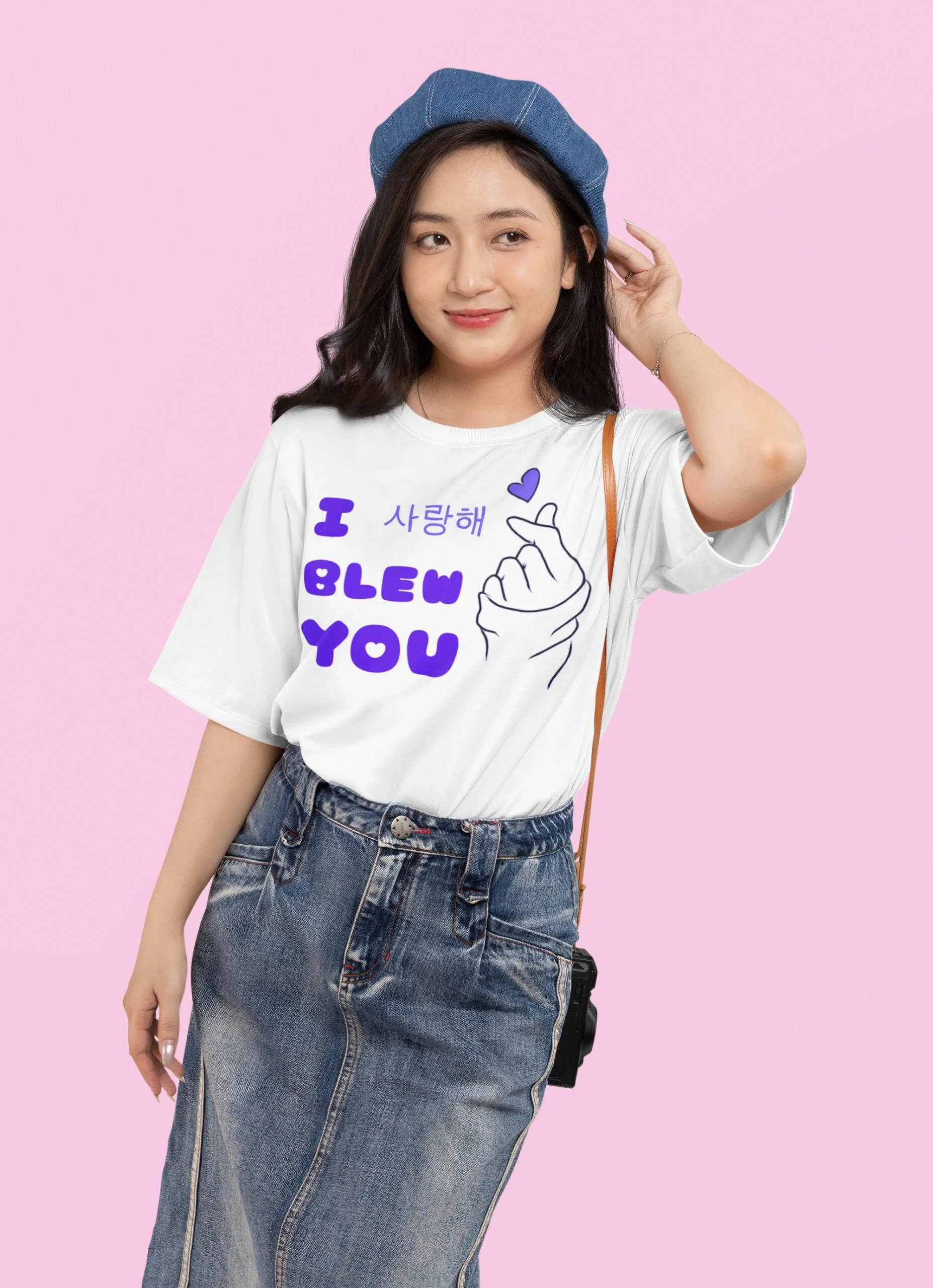 mockup-of-a-smiling-woman-wearing-an-oversized-t-shirt-and-denim-garments-in-a-studio-m50535